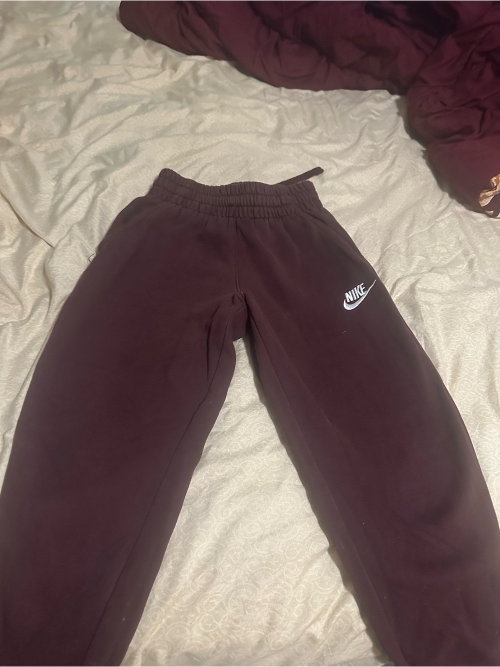 Nike Kids Burgundy Sweatpants with White Swoosh